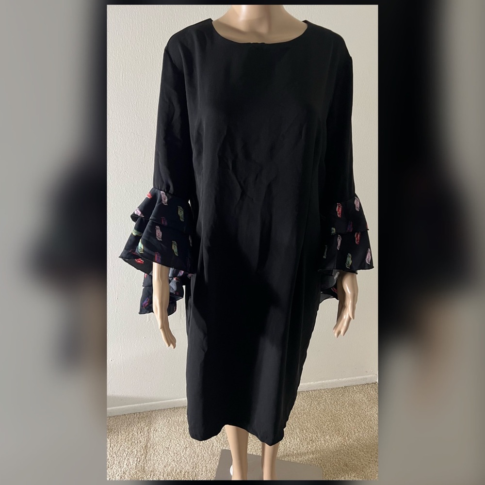 Marina Kaneva Black Dress with Race Car Sleeves